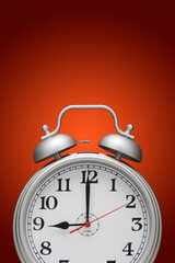 Alarm clock isolated over red background