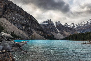 Moraine lake with rocky mountains and turquoise lake on gloomy at Banff national park
