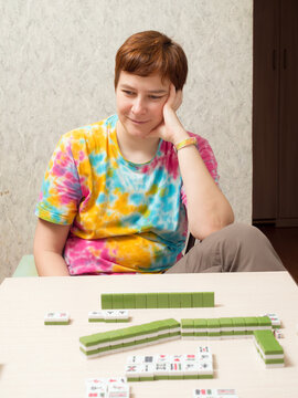 Woman Playing Mahjong