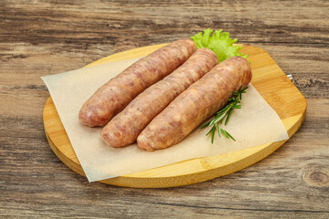Raw pork meat sausages for grill