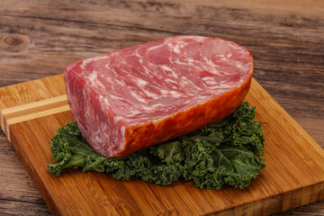 Beef ham piece over board