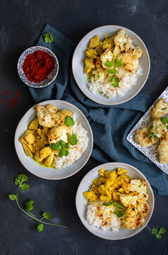 Coconut curry chicken with roasted cauliflower and rice