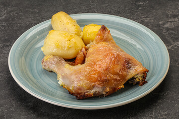 Roasted chicken leg with potato