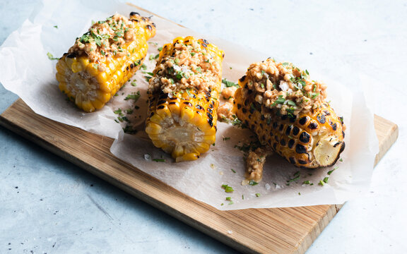 Roasted corn with peanut sauce