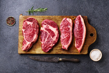 Variety of fresh Black Angus Prime raw beef steaks