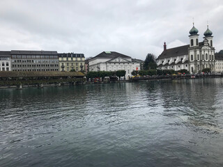 view of Jesuit Church near the river Reuss in the old town of Lucerne, Switzerland