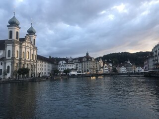 view of Jesuit Church near the river Reuss in the old town of Lucerne, Switzerland