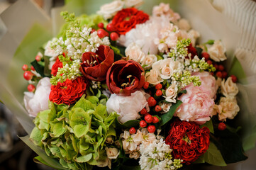 close-up of bright bouquet of different fresh spring flowers