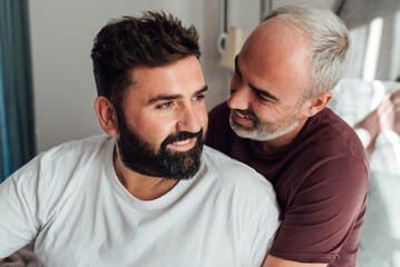 Fototapeta premium Two sexy men. Love and relationships at home. Sex and passion. Tenderness and beauty. Two men love each other.