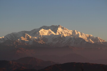 Naklejka na ściany i meble sunrise in the mountains(Kanchenjunga peak)