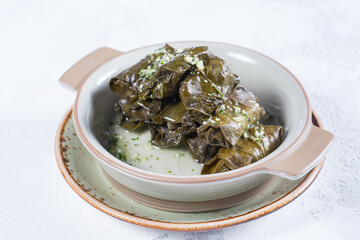 Macro Photo of Traditional Turkish Dolma, Sarma or Dolmades on White Plate.