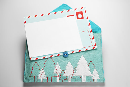 Blank card and fabric envelope with embroidered Christmas trees