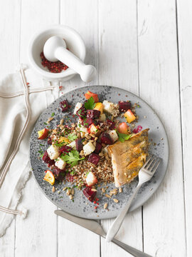 Pikeperch fillet on quinoa with beetroot