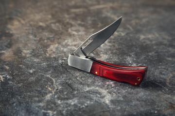 pocket knife on the stone