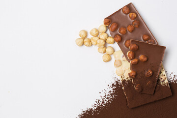 Many various chocolate bars and nuts