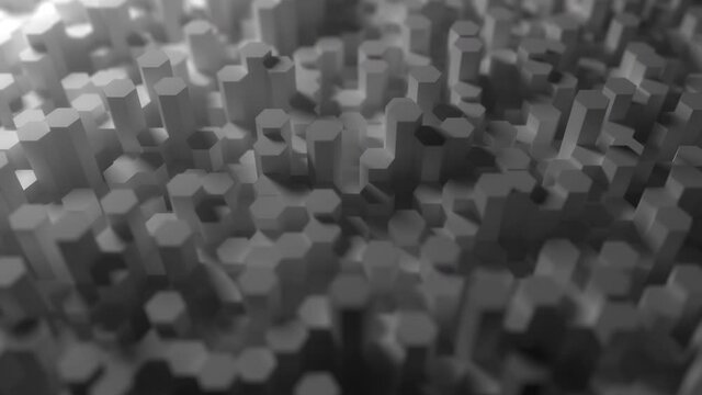 White plaster hexagonal prisms change their heights, looping abstract 3D animation