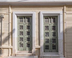 classic design two-family house entrance doors, Athens Greece.