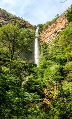 waterfall in the forest. waterfall in the Salto do Itiquira Park in Formosa Goiás State in Brazil.