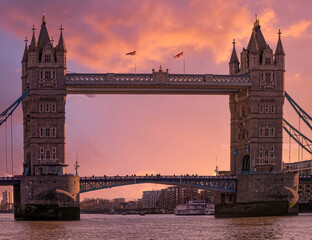 London, England, the tower bridge over Thames river under dramatic sky.