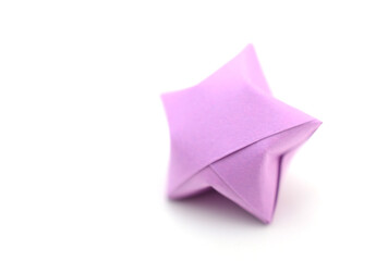 Fototapeta premium A purple lucky origami star