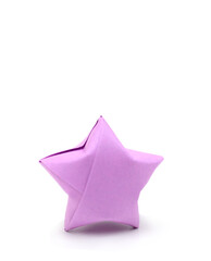 A origami lucky star on white