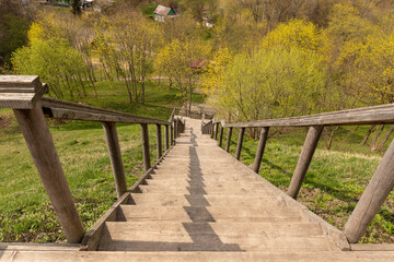 Obraz premium wooden staircase to the stream