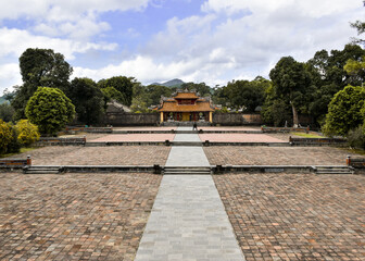 View in perspective of a huge pavilion that takes to Hien Duc Gate, in Minh Mang Tomb complex. Hue, Vietnam.