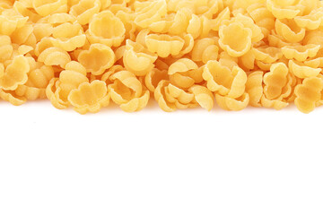 Raw italian pasta, gnocchi. Dried pasta isolated on white background. Close-up. Full depth of field