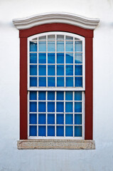 Fototapeta premium Colonial window at historical center, Sao Joao del Rei, Brazil