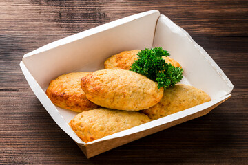 chicken cutlets with herbs on a dark wooden background, homemade chicken cutlets Free copy space