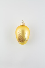 golden ball for christmas tree on white background