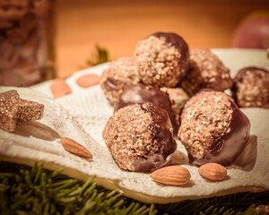 Homemade Christmas biscuits and decoration on wooden table