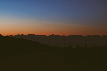 Fototapeta na wymiar mountains in the setting sun