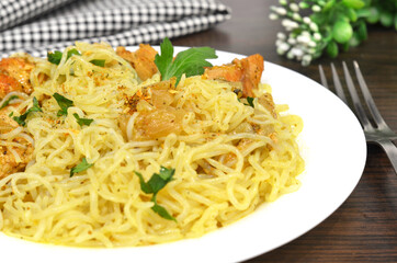 Konjac or Shirataki noodles with pork, grilled meat and herbs. Japanese traditional dish. Healthy food for weight loss, keto diet concept. Rice glass noodles