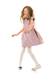 Happy Girl with Long Hair Wearing Pink Dress Having Fun