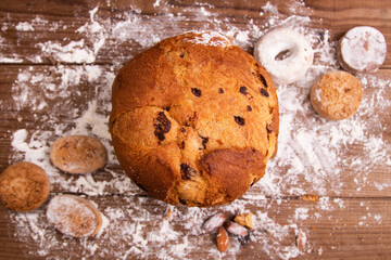 top view of christmas panettone in rustic kitchen wood