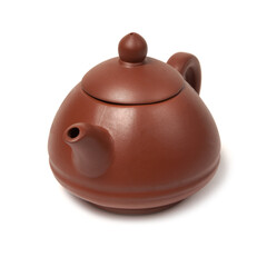 Old purple yixing clay Chinese teapot yuan zhu hu type for tea ceremony isolated on white