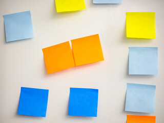 Image of different colour stickers on the whiteboard