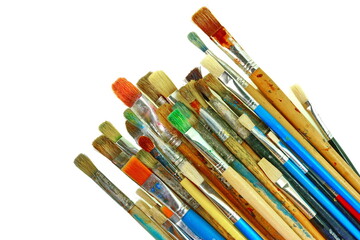 Obraz premium Various dirty paint brushes. Paints and brushes isolated on white background.