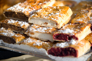 Various flavor strudel for sale in pastry shop