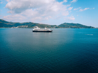 Large Cruise ship sailing across The Andaman sea - Aerial image. Beautiful  sea landscape