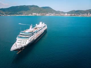 Large Cruise ship sailing across The Andaman sea - Aerial image. Beautiful  sea landscape