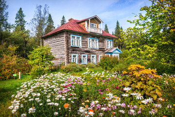Fototapeta na wymiar Archimandrite's Wooden Dacha in the Botanical Garden on the Solovetsky Islands