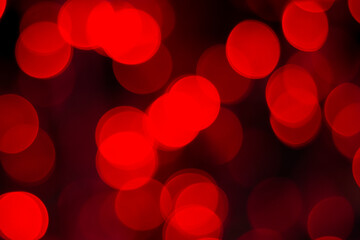 Holiday abstract bokeh background. Red lighting defocus background. 