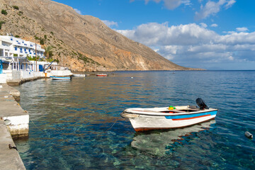 Fototapeta na wymiar The isolated idyllic port village of Loutro, only accessible by foot or boat in the Sfakia regfion of Southern Crete, Greece