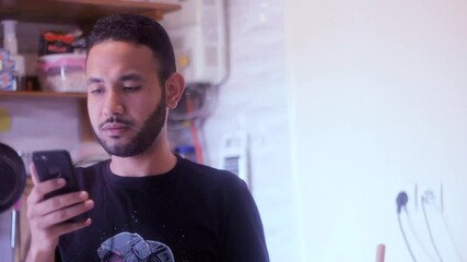 A man recieving and replying to an email 