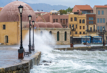 Storm flooded sea front streets of Kasteli, the of town of Chania, the second largest city of...