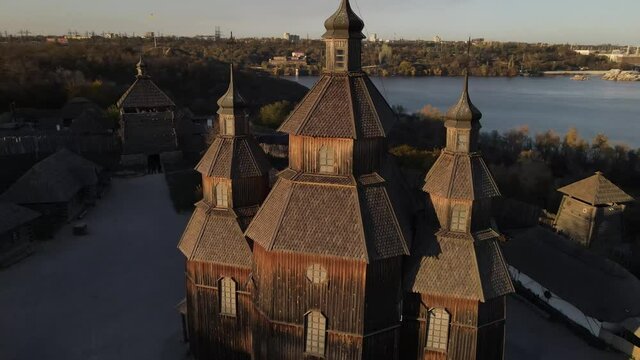 Khortytsya, Zaporozhye Sich drone, Dnipro Hydroelectric Power Plant, dam. 
Old church on the island of Khortitsa. Zaporozhye drone, Zaporizhia, Ukraine, over the dam.
