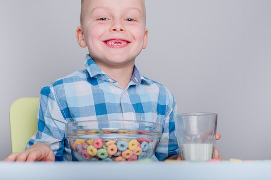 Portrait Of A Child Eating Breakfast