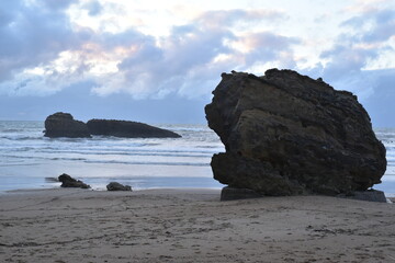 Fototapeta na wymiar Beach with a rock in Biarritz, France